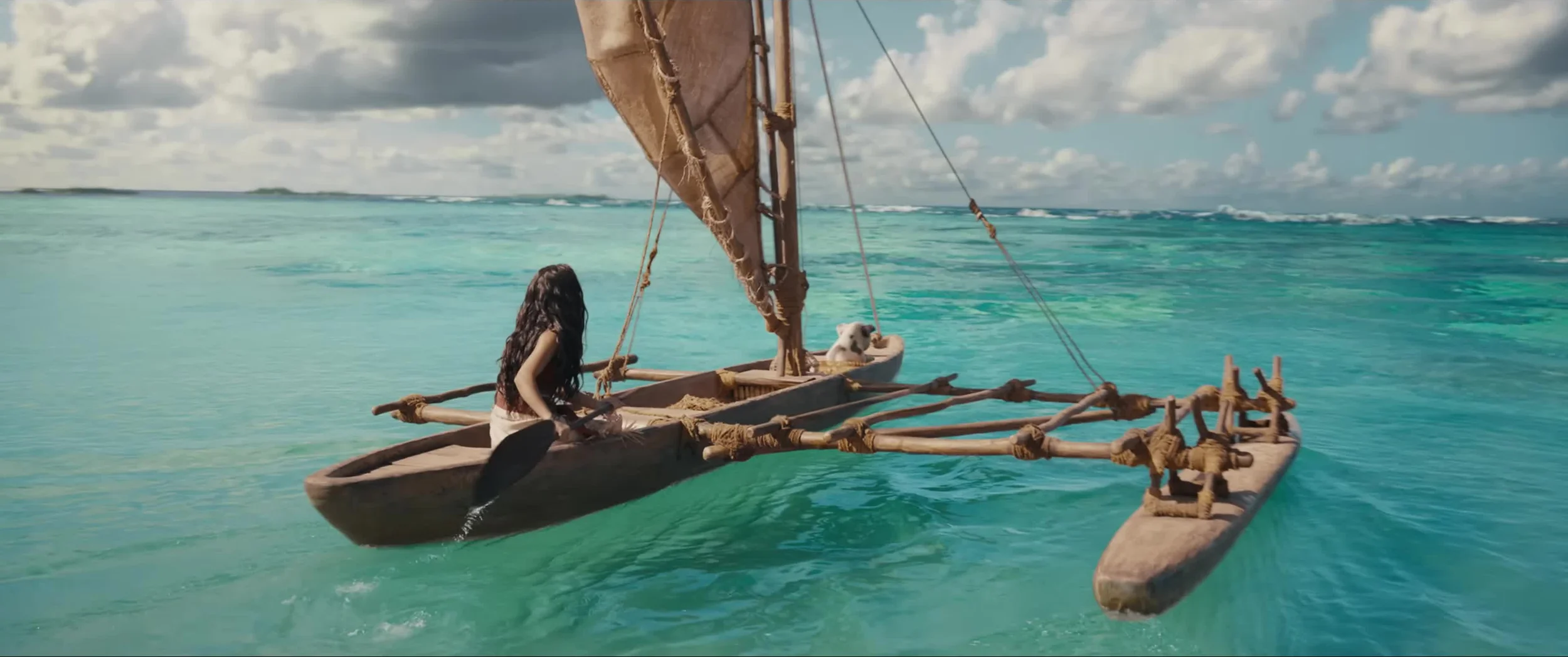 Moana kiên cường chèo lái, khám phá đại dương bao la.
